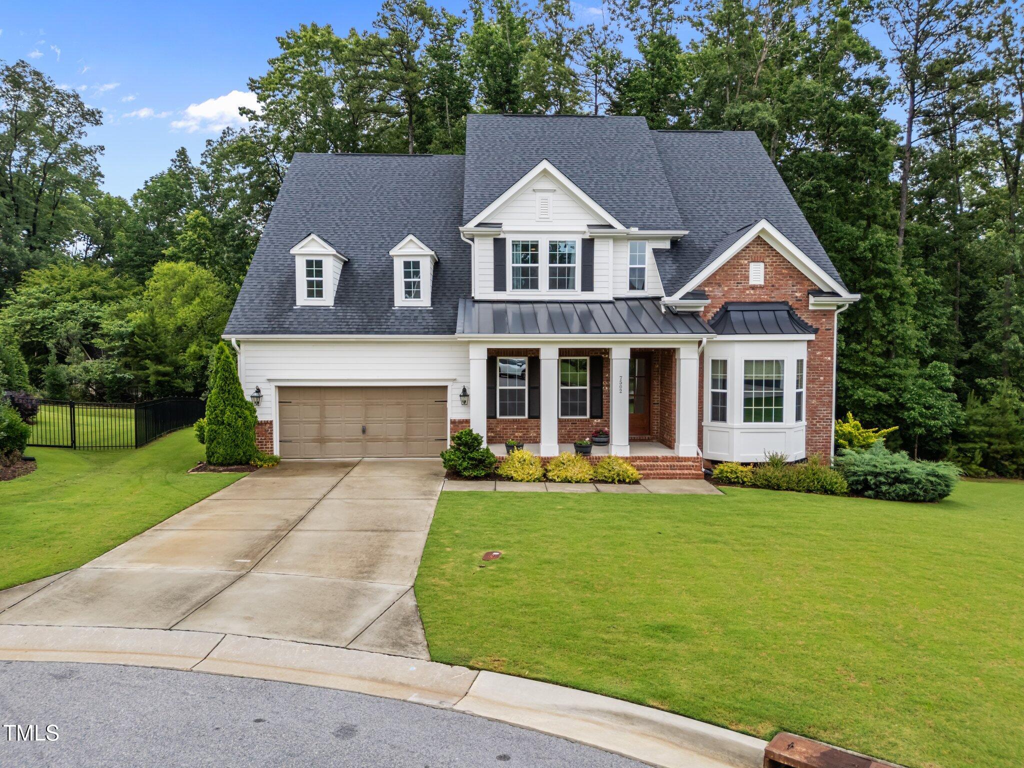 7502 Latteri Court Raleigh, NC 27613 - Photo 2 of 60 2-web-or-mls-DJI_20250616091150_0846_D