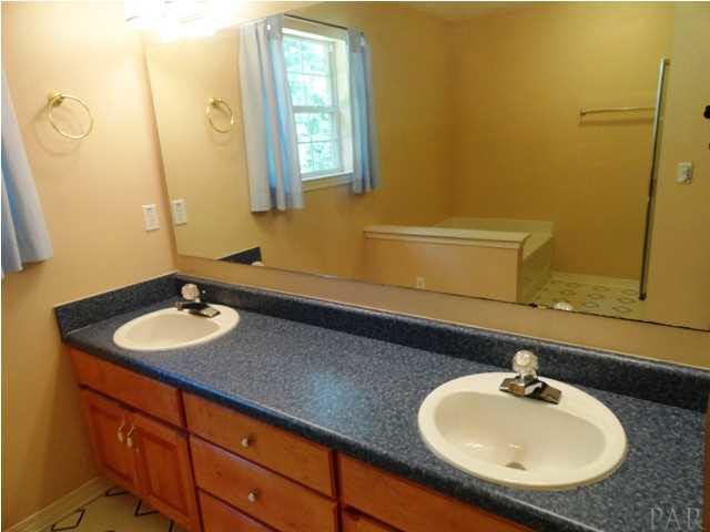 5524 Fox Fire Road Milton, FL 32570 - Photo 14 of 25 BATH INCLUDES DOUBLE VANITIES