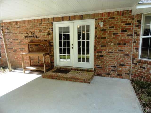5524 Fox Fire Road Milton, FL 32570 - Photo 19 of 25 FRENCH DOORS OPEN FROM GREATROOM TO PATIO