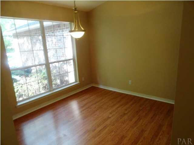 5524 Fox Fire Road Milton, FL 32570 - Photo 5 of 25 FORMAL DINING WITH HARDWOOD FLOORS