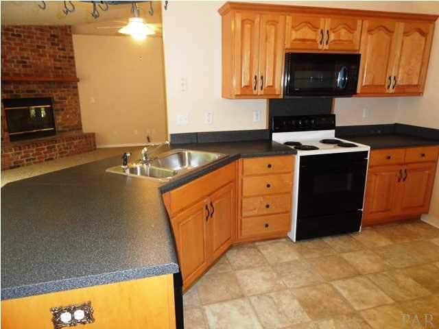 5524 Fox Fire Road Milton, FL 32570 - Photo 8 of 25 BUILT IN MICROWAVE, ELECTRIC RANGE, DISHWASHER