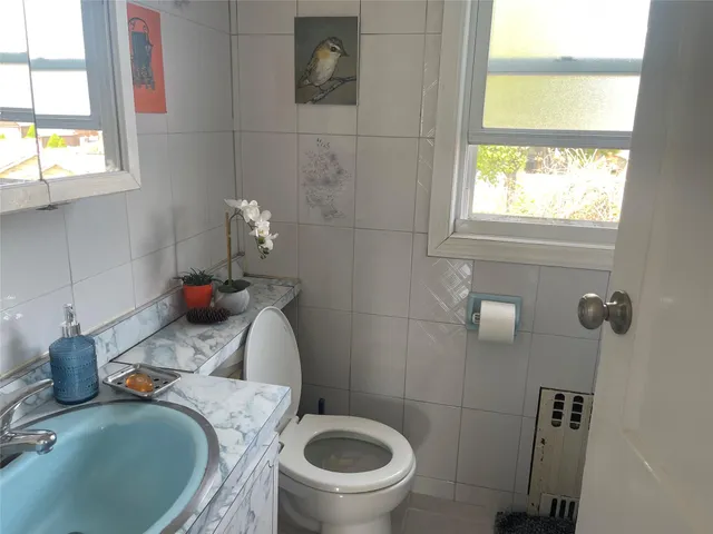 a view of a small yard from a balcony