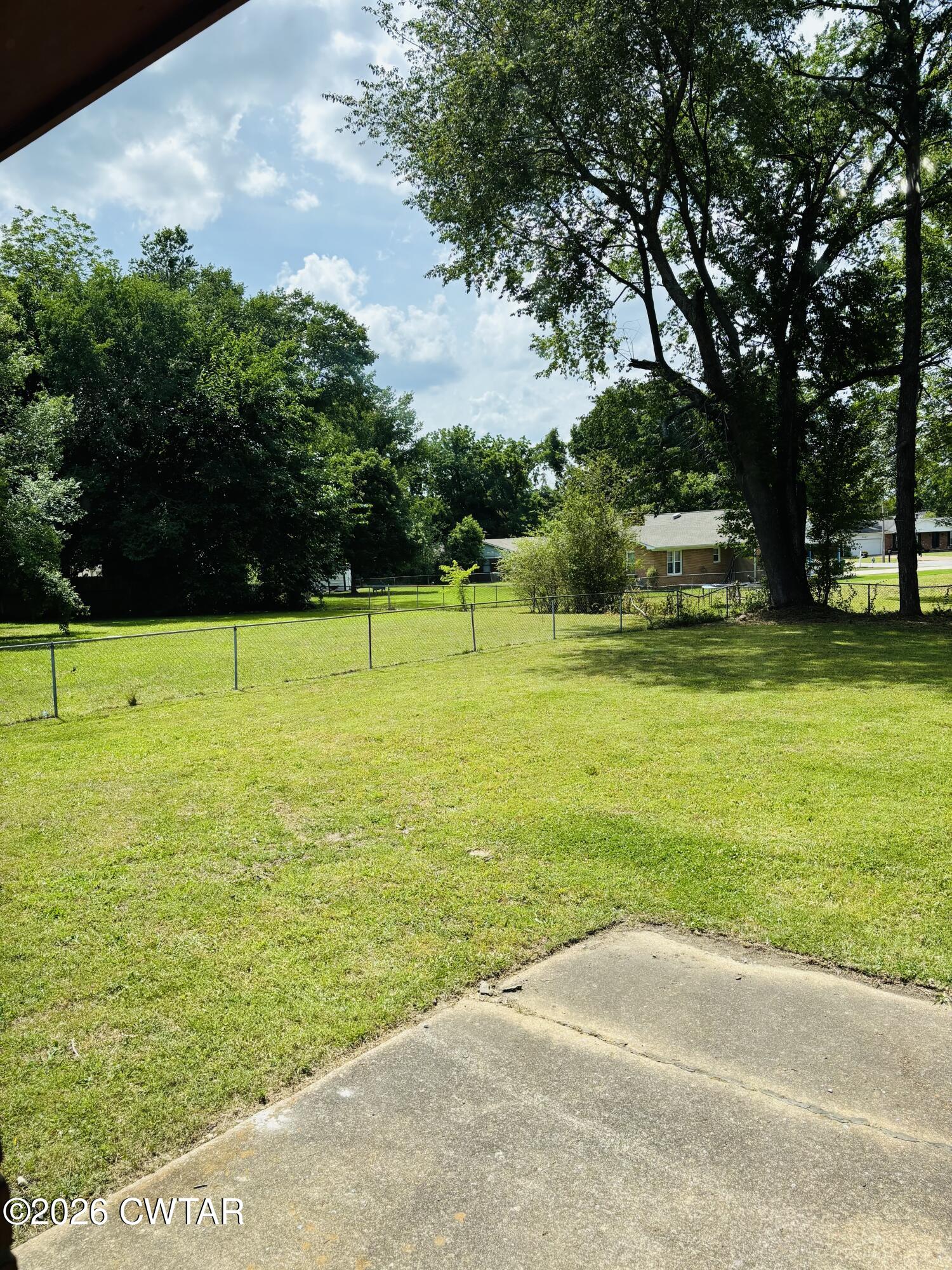 149 Commanche Trail Jackson, TN 38305 - Photo 14 of 15 a view of a swimming pool and a big yard