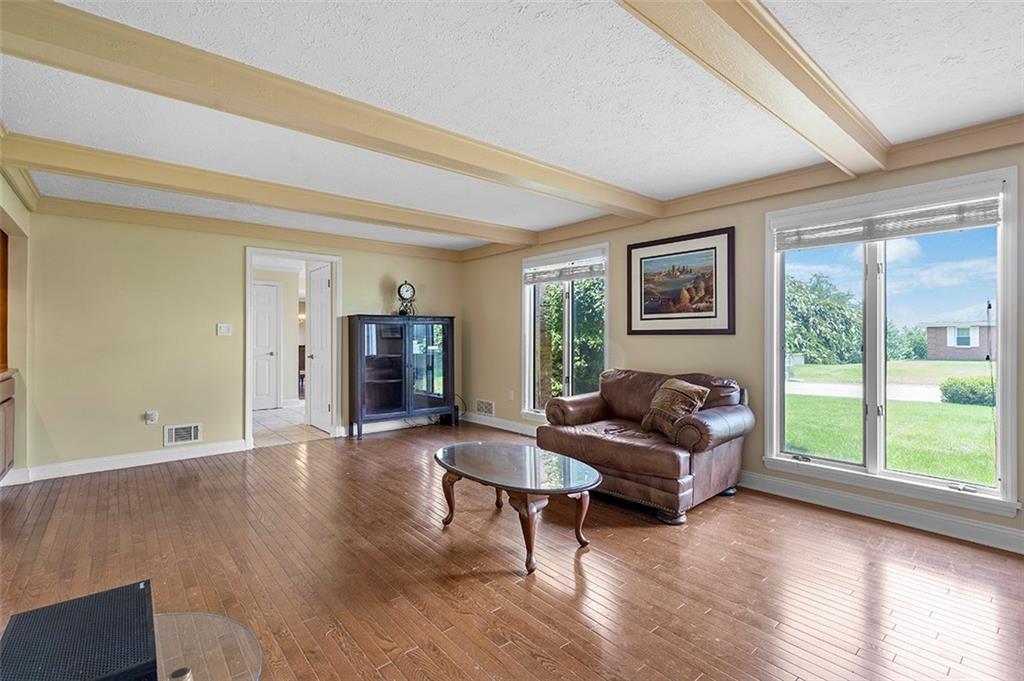 533 Woodland Road Pittsburgh, PA 15237 - Photo 17 of 43 a living room with furniture and a large window