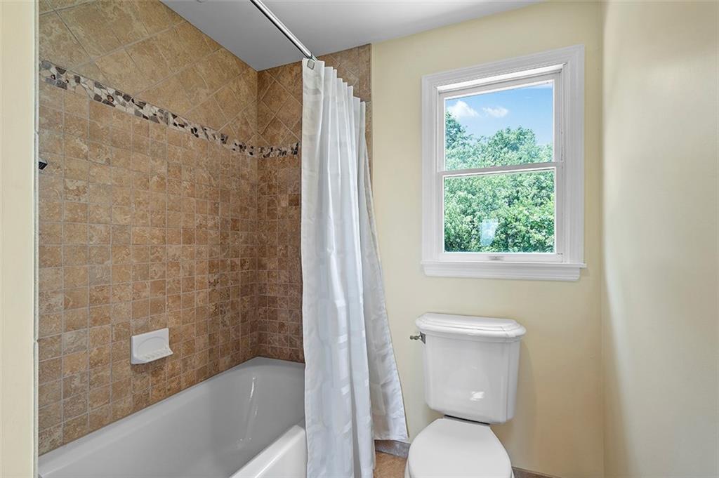 533 Woodland Road Pittsburgh, PA 15237 - Photo 28 of 43 a bathroom with a toilet and shower
