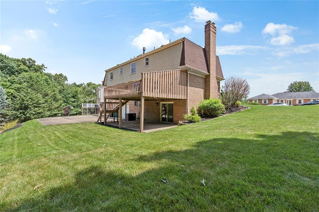 533 Woodland Road Pittsburgh, PA 15237 - Photo 41 of 43 a view of a house with a yard