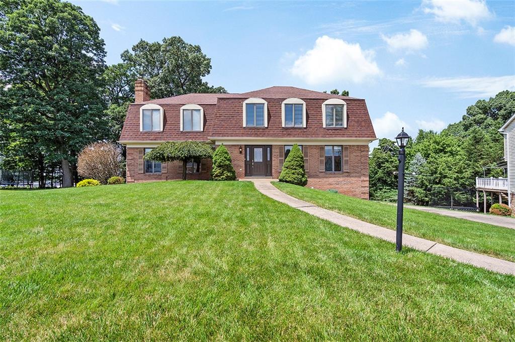 533 Woodland Road Pittsburgh, PA 15237 - Photo 43 of 43 a front view of a house with a yard