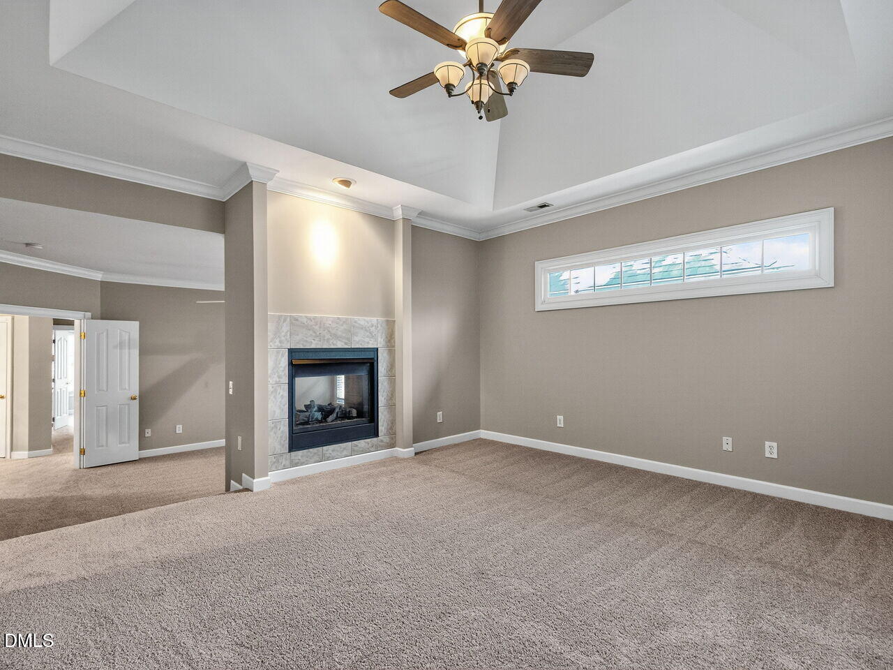 3900 Bentley Bridge Road Raleigh, NC 27612 - Photo 16 of 27 a view of an empty room with a fireplace