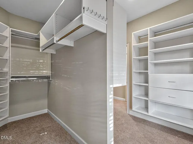 a view of an empty walk in closet