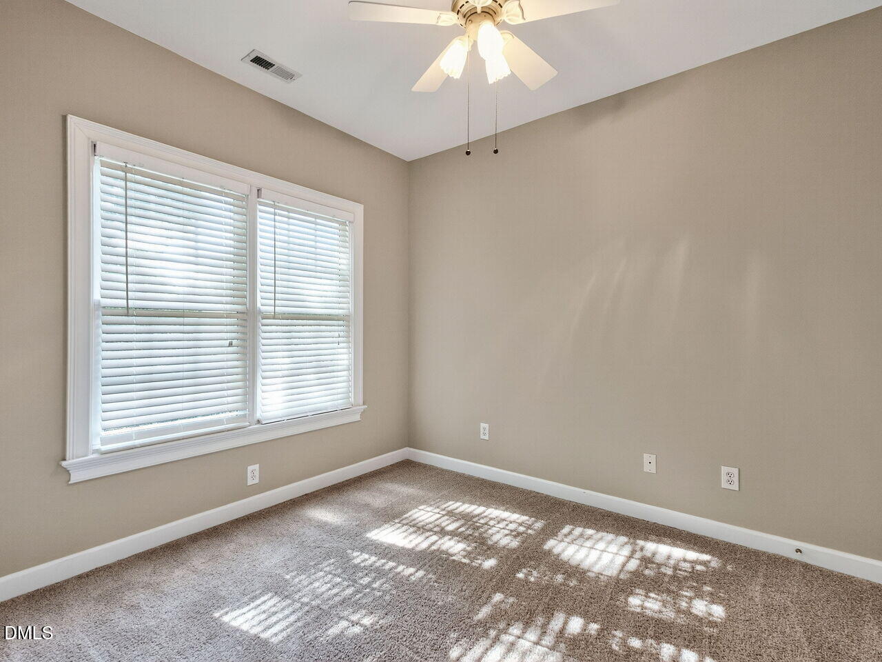 3900 Bentley Bridge Road Raleigh, NC 27612 - Photo 22 of 27 a view of an empty room with a window