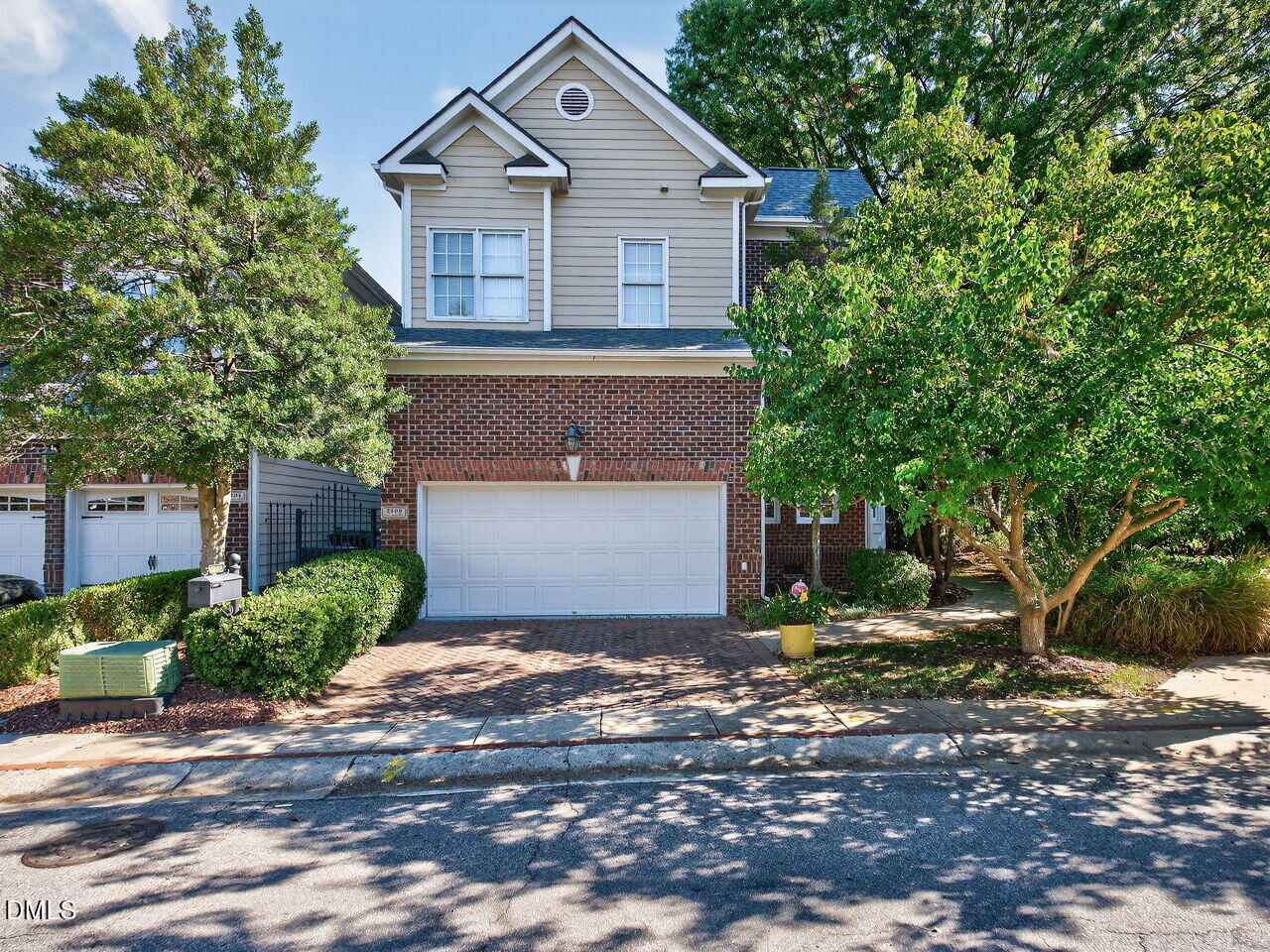 3900 Bentley Bridge Road Raleigh, NC 27612 - Photo 25 of 27 a front view of a house with a yard and garage