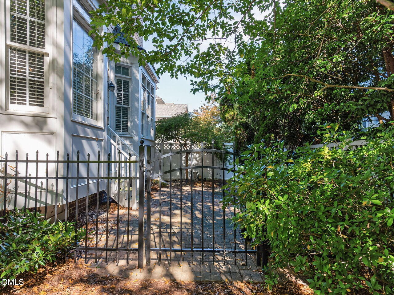 3900 Bentley Bridge Road Raleigh, NC 27612 - Photo 26 of 27 a view of a house with a tree