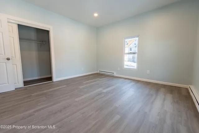 a bathroom with a white tub