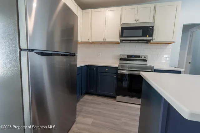 a bathroom with a sink and a shower