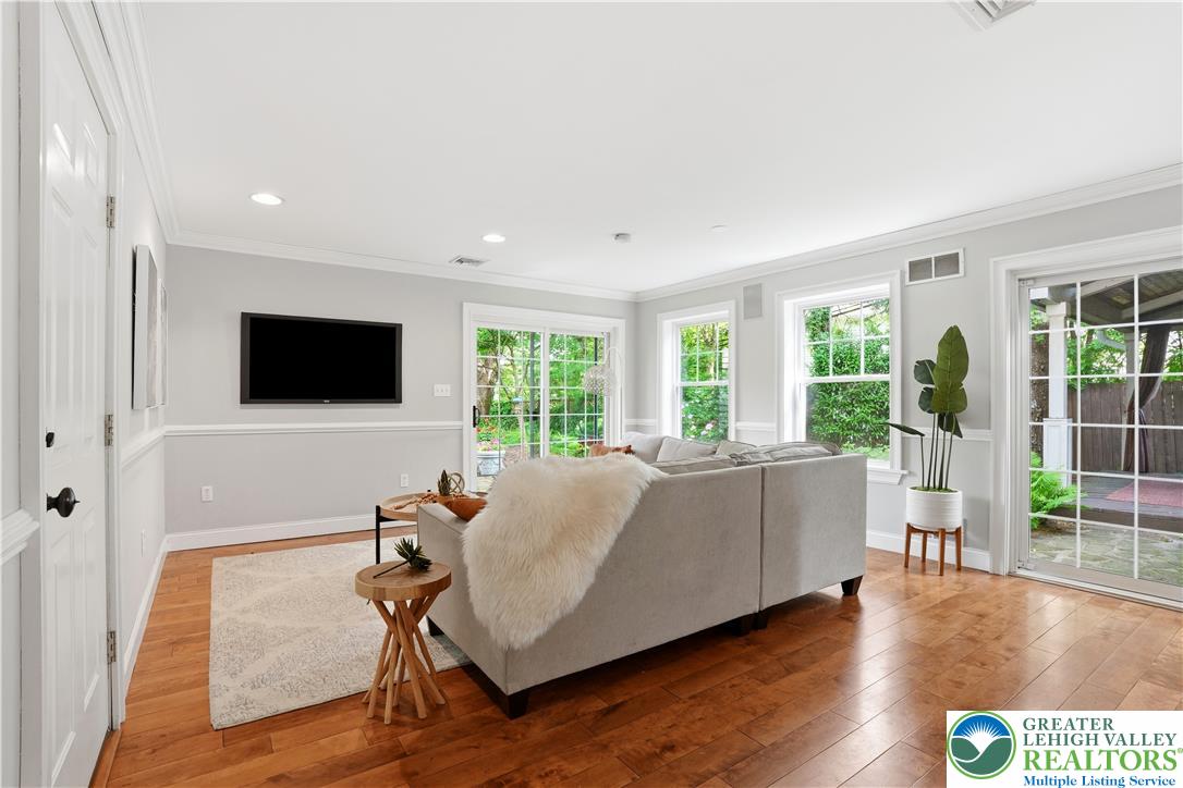 2014 Linden Street Bethlehem, PA 18017 - Photo 29 of 85 Hardwood floors and natural light illuminate this open living area, featuring crown molding and recessed lighting.