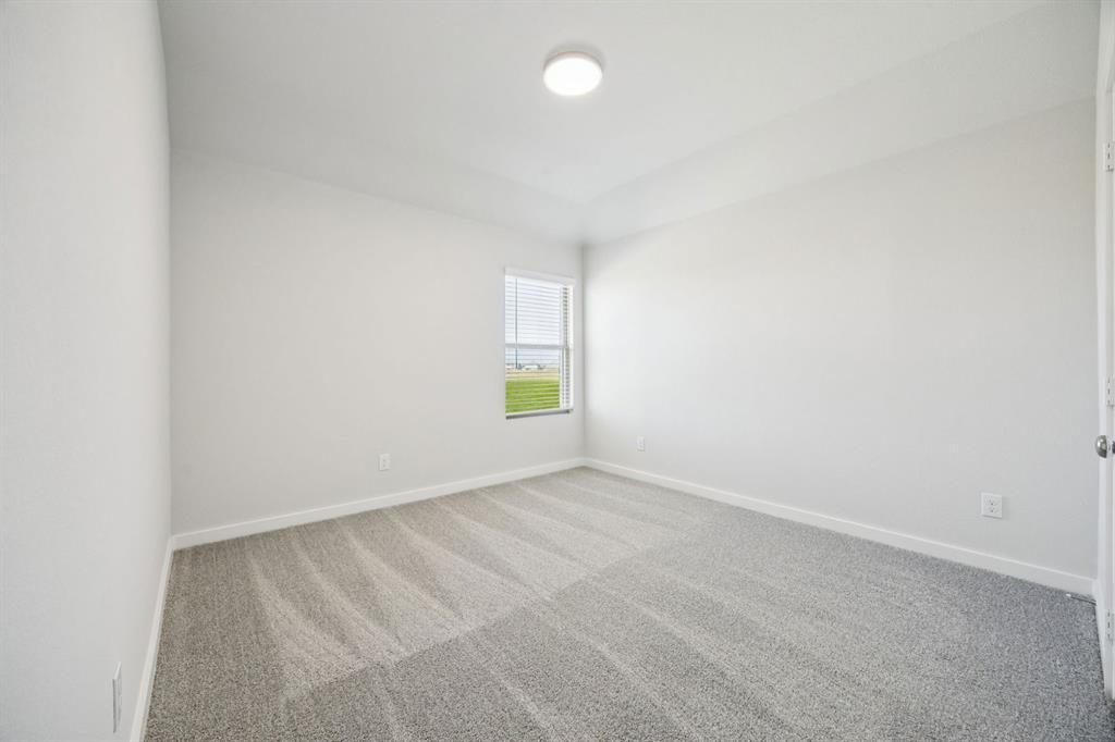 9509 Rattlesnake Trail Crowley, TX 76036 - Photo 25 of 35 an empty room with windows