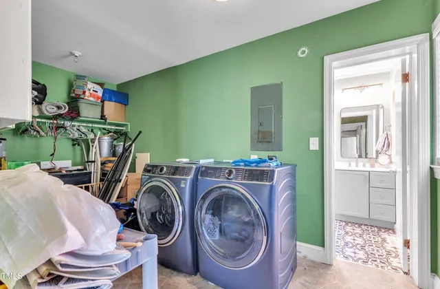 a view of room with washer and dryer