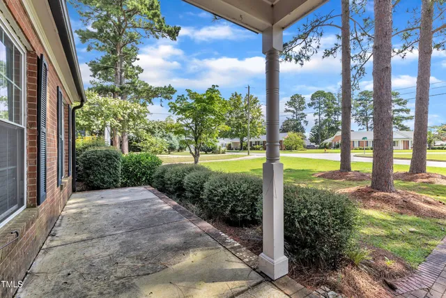 a view of a garden with an outdoor space