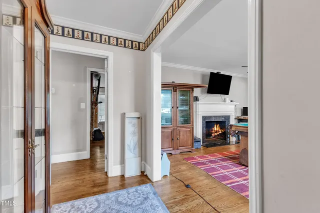 a view of a livingroom with furniture and a fireplace