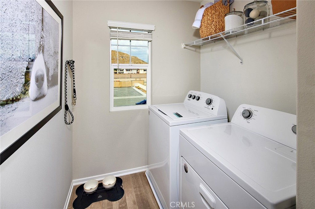 30607 Cyclone Avenue Winchester, CA 92596 - Photo 17 of 18 a utility room with dryer and washer