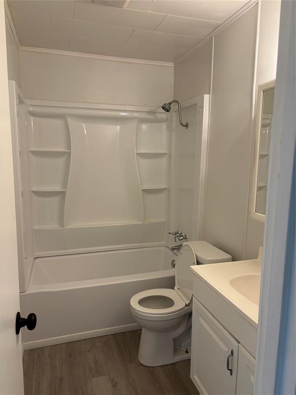 2293 County Road Powderly, TX 75473 - Photo 16 of 20 a bathroom with a toilet and a shower
