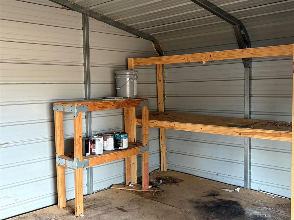2293 County Road Powderly, TX 75473 - Photo 19 of 20 a view of storage and utility room