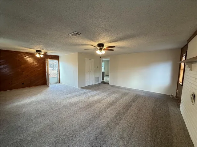 a view of a livingroom with a fireplace