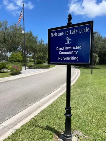 a view of a lake with a yard