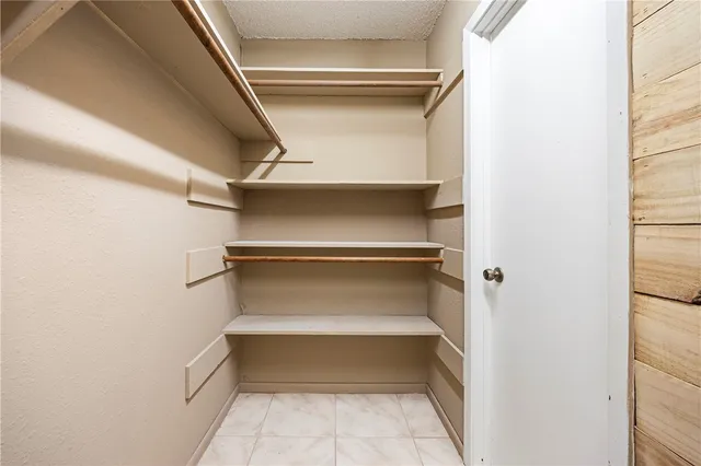 a storage room with an empty shelves