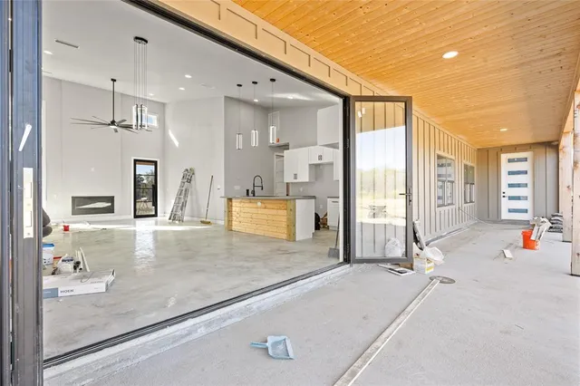 a large bathroom with a large tub and shower