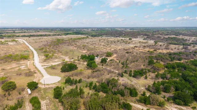 a view of a house with a garden