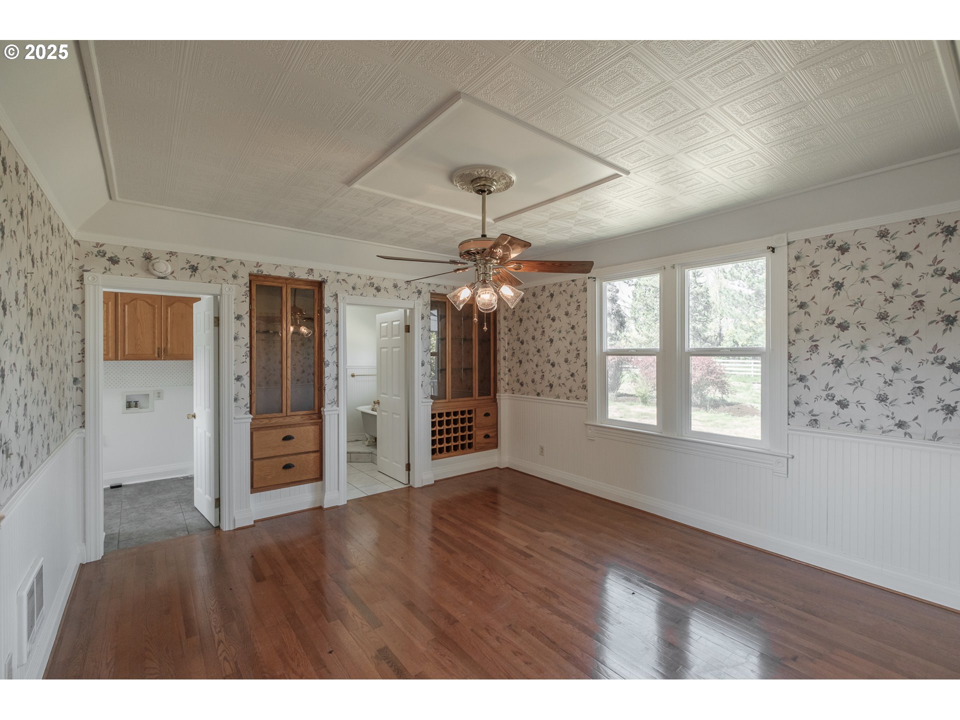 38588 Goar Road Scio, OR 97374 - Photo 18 of 48 a view of an empty room with window and wooden floor