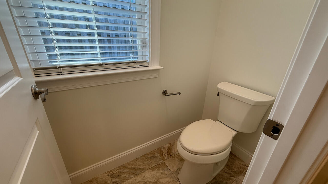143 Christian Drive Santa Rosa Beach, FL 32459 - Photo 18 of 25 a white toilet sitting next to a window