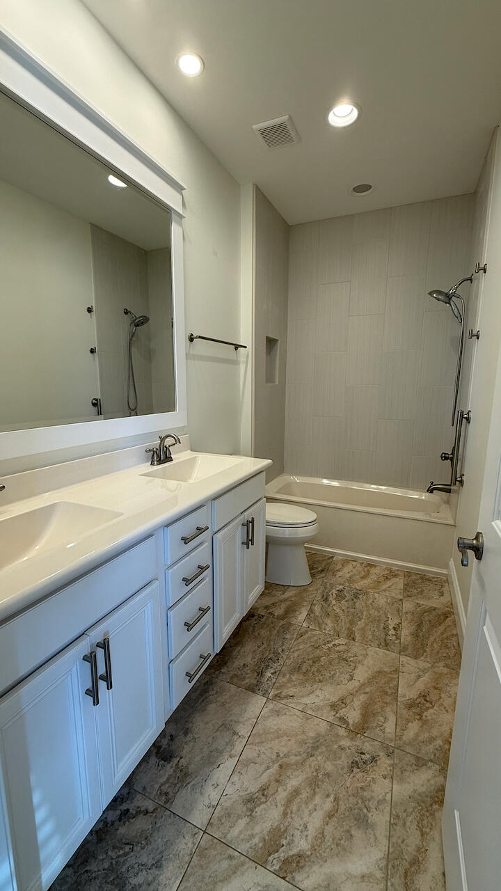 143 Christian Drive Santa Rosa Beach, FL 32459 - Photo 23 of 25 a bathroom with a sink and a mirror