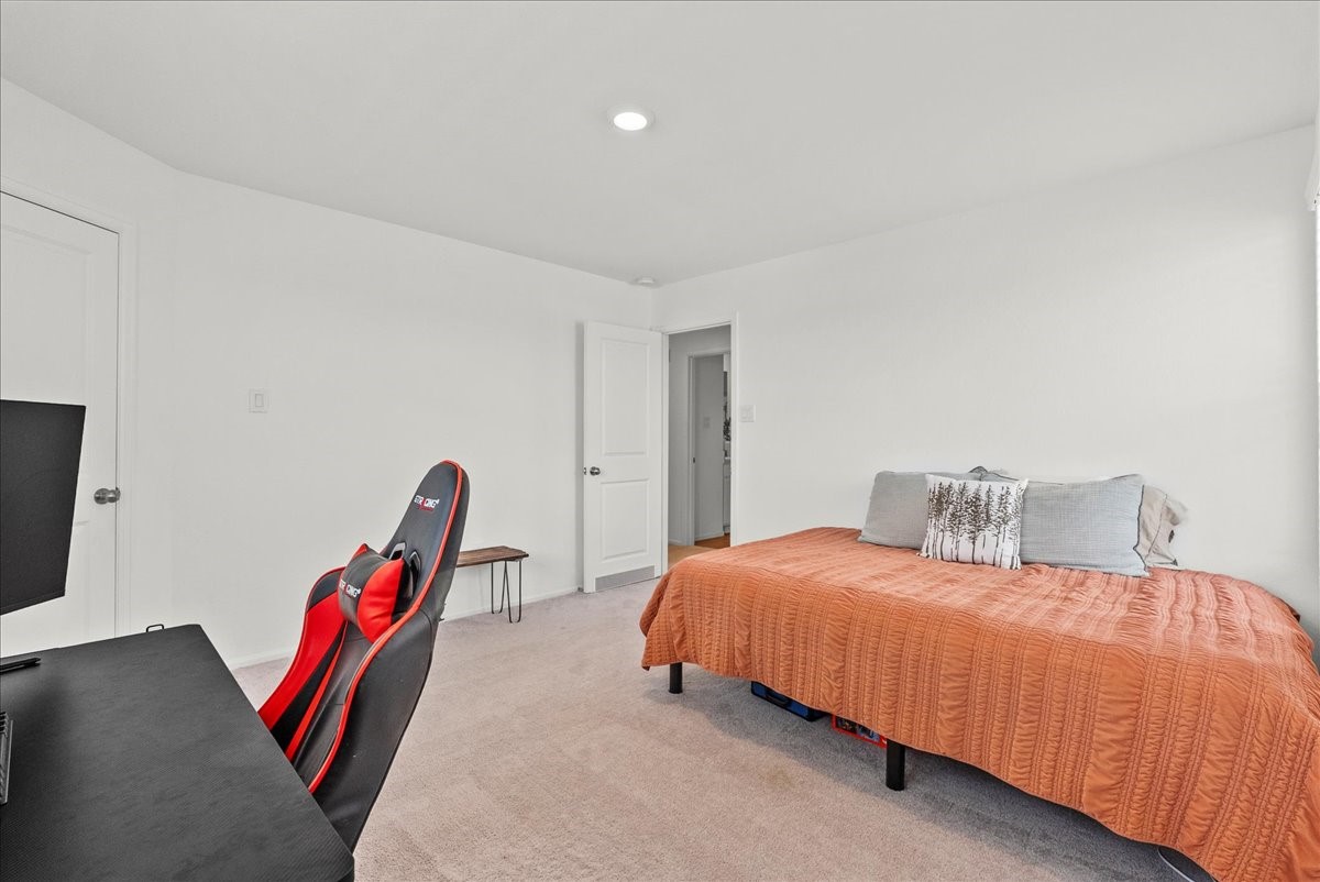 14410 Boyton Holw Trace Rosharon, TX 77583 - Photo 26 of 35 3rd Bedroom is the largest of the secondary bedrooms and offers a walk in closet with a small window to give you a glimmer of natural lighting - a great touch!