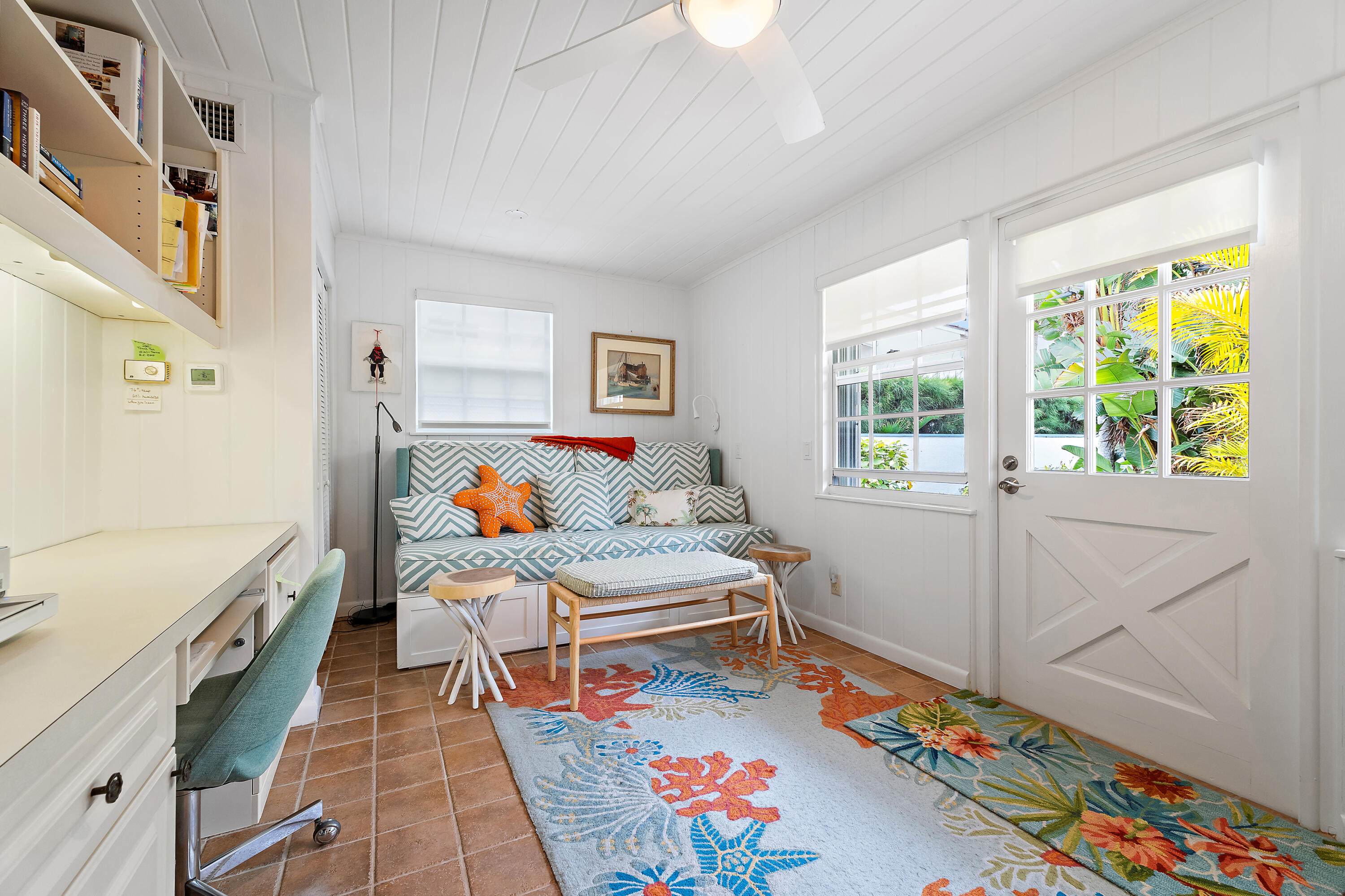 240 Celestial Way, Unit 2 Juno Beach, FL 33408 - Photo 30 of 59 a bedroom with a bed and a window