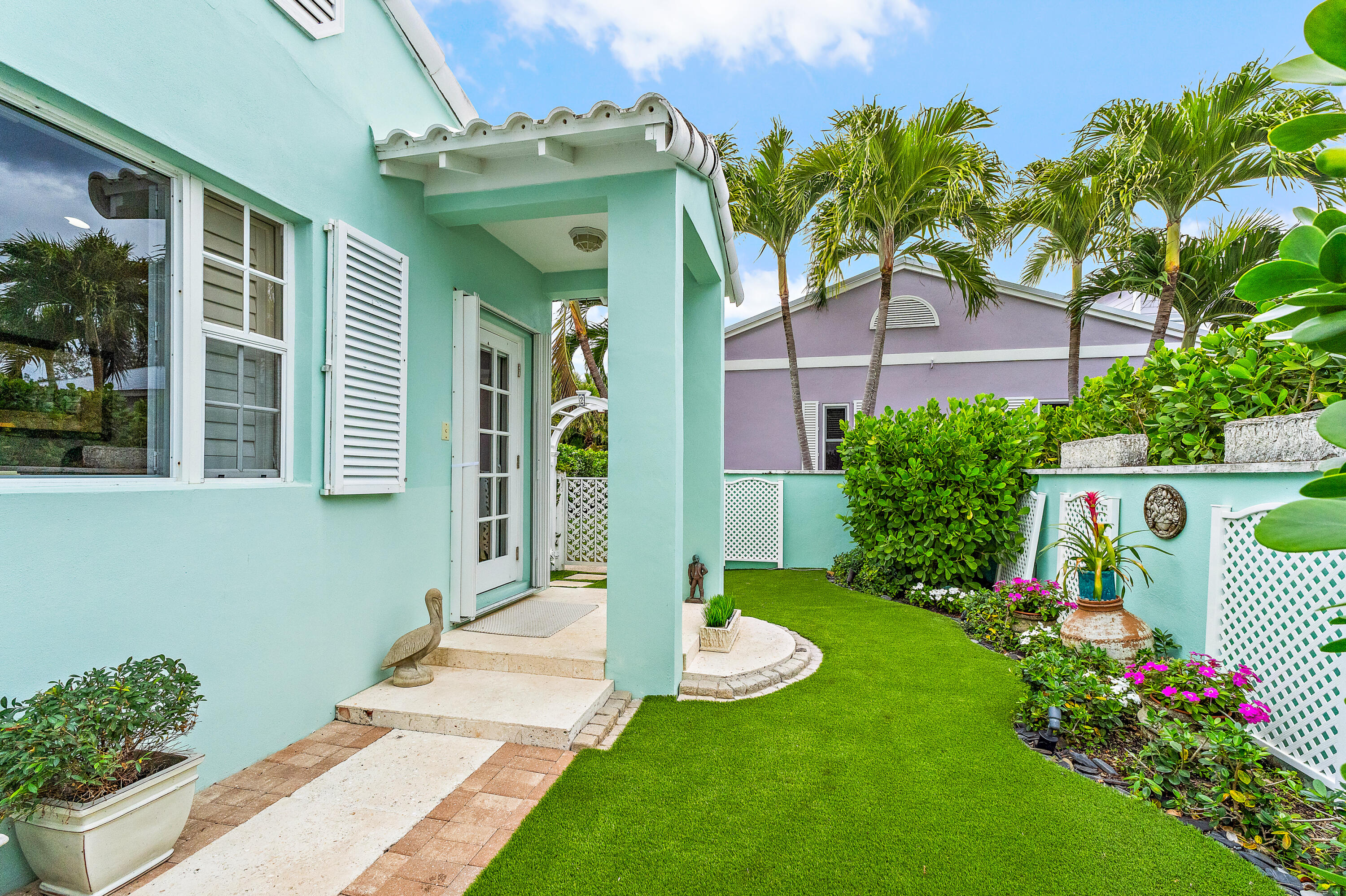 240 Celestial Way, Unit 2 Juno Beach, FL 33408 - Photo 4 of 46 Exterior Front