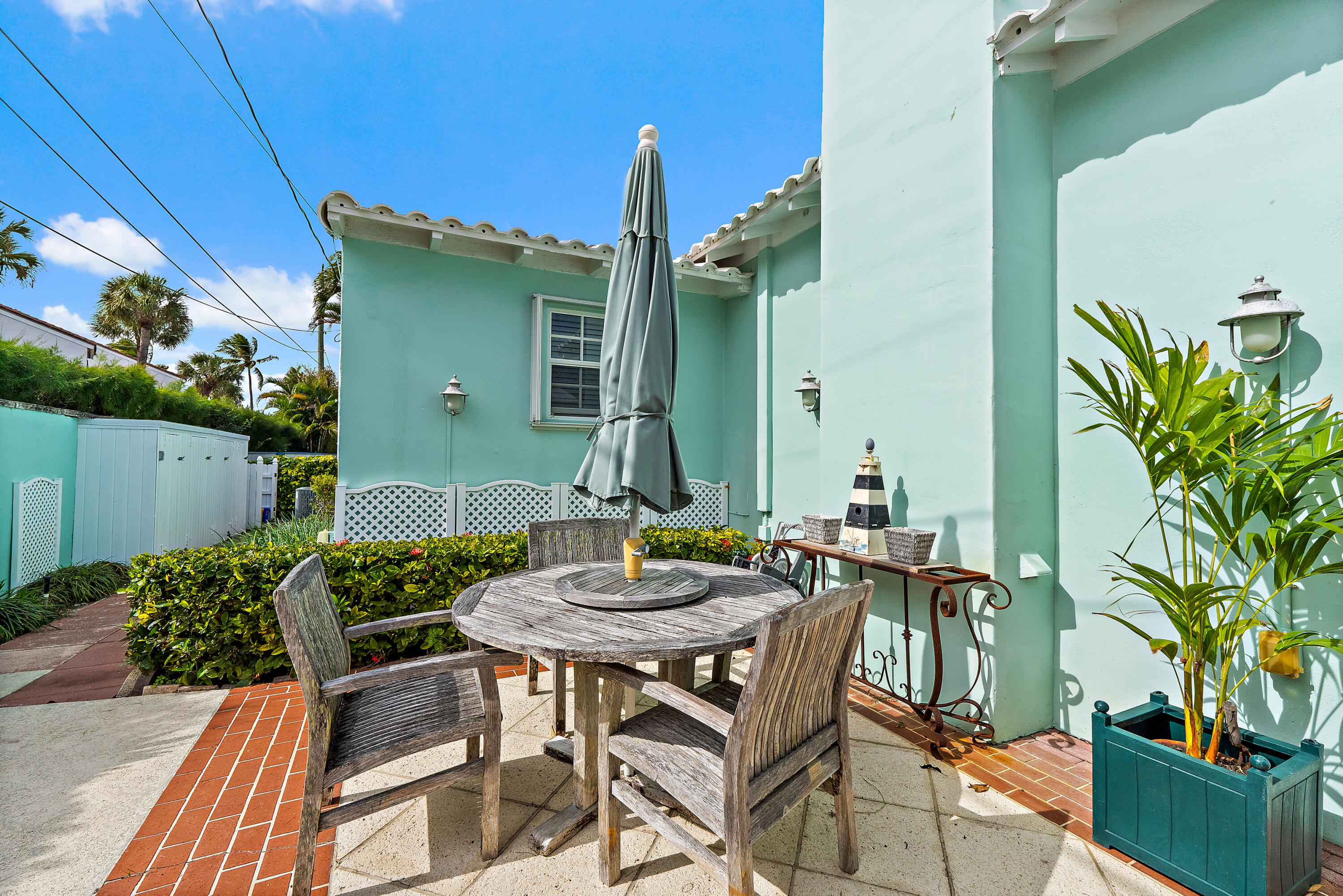 240 Celestial Way, Unit 2 Juno Beach, FL 33408 - Photo 42 of 59 a view of a house with backyard and sitting area