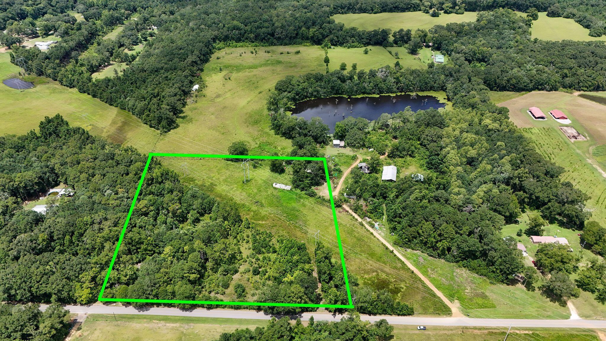 601 Oak Grove Road Westville, FL 32464 - Photo 4 of 12 an aerial view of residential houses with outdoor space and trees