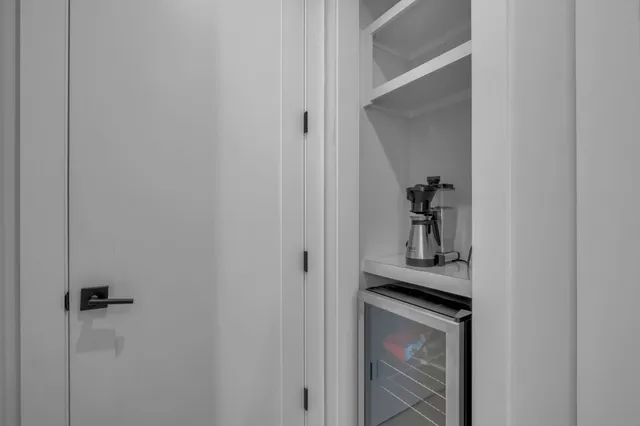 a view of a livingroom from a hallway