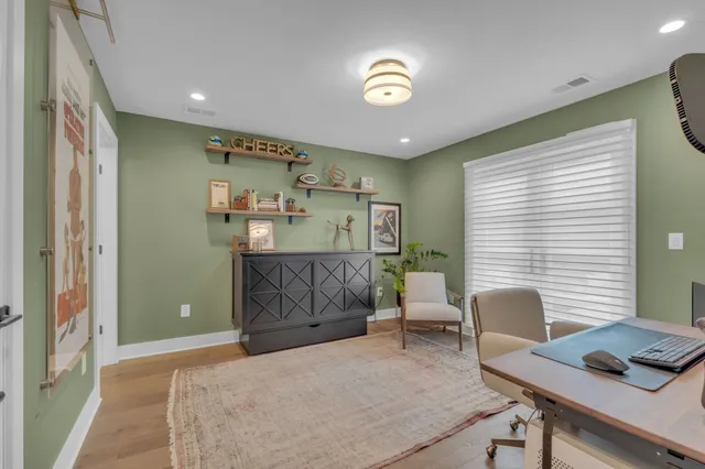 a workspace with furniture and window