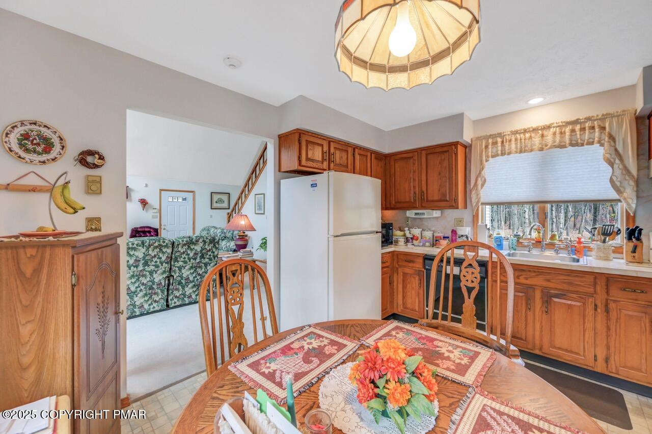 183 Panther Run Road Jim Thorpe, PA 18229 - Photo 20 of 59 a bedroom with a bed and a chandelier