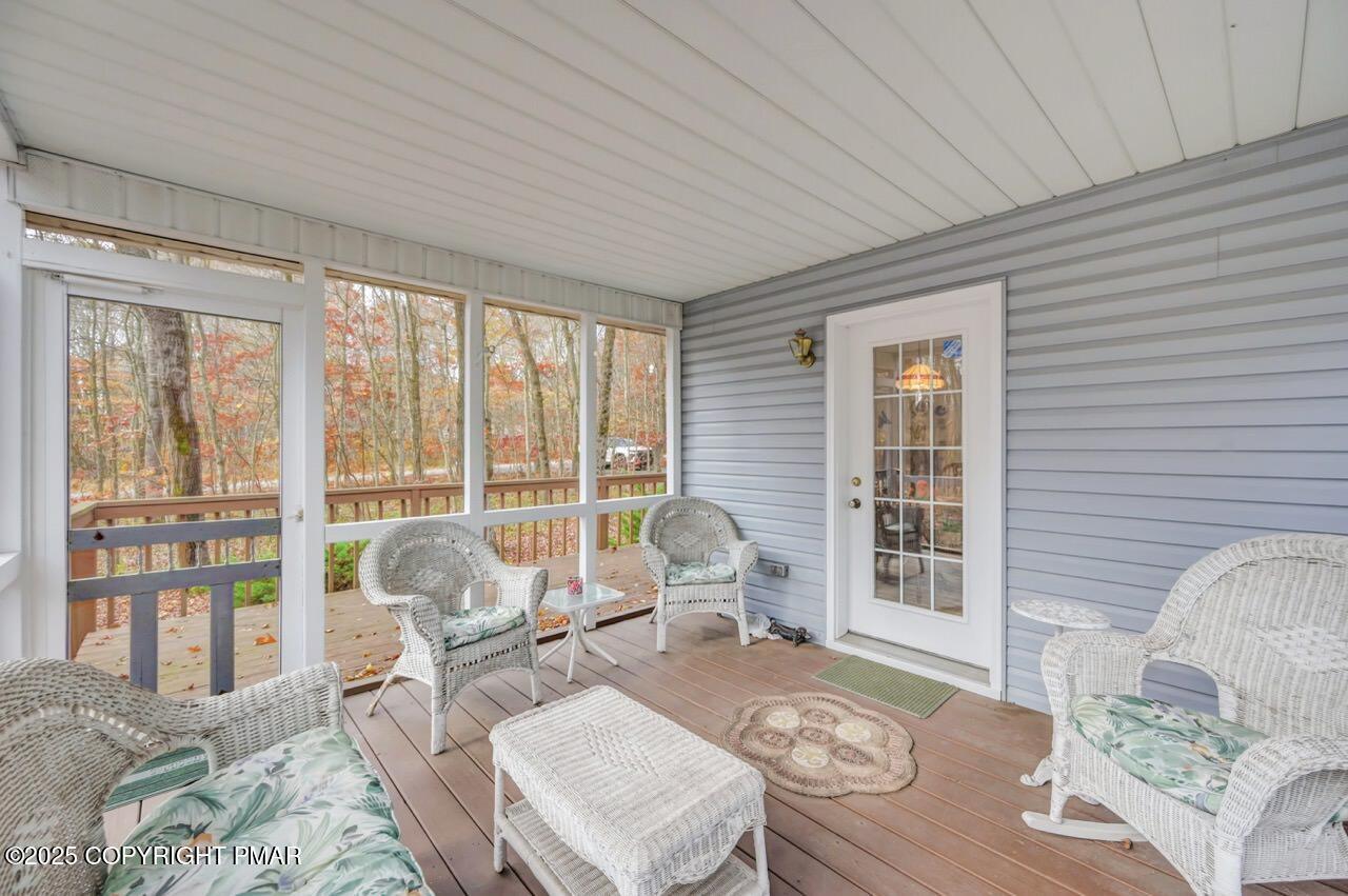 183 Panther Run Road Jim Thorpe, PA 18229 - Photo 23 of 59 a living room with furniture and floor to ceiling windows