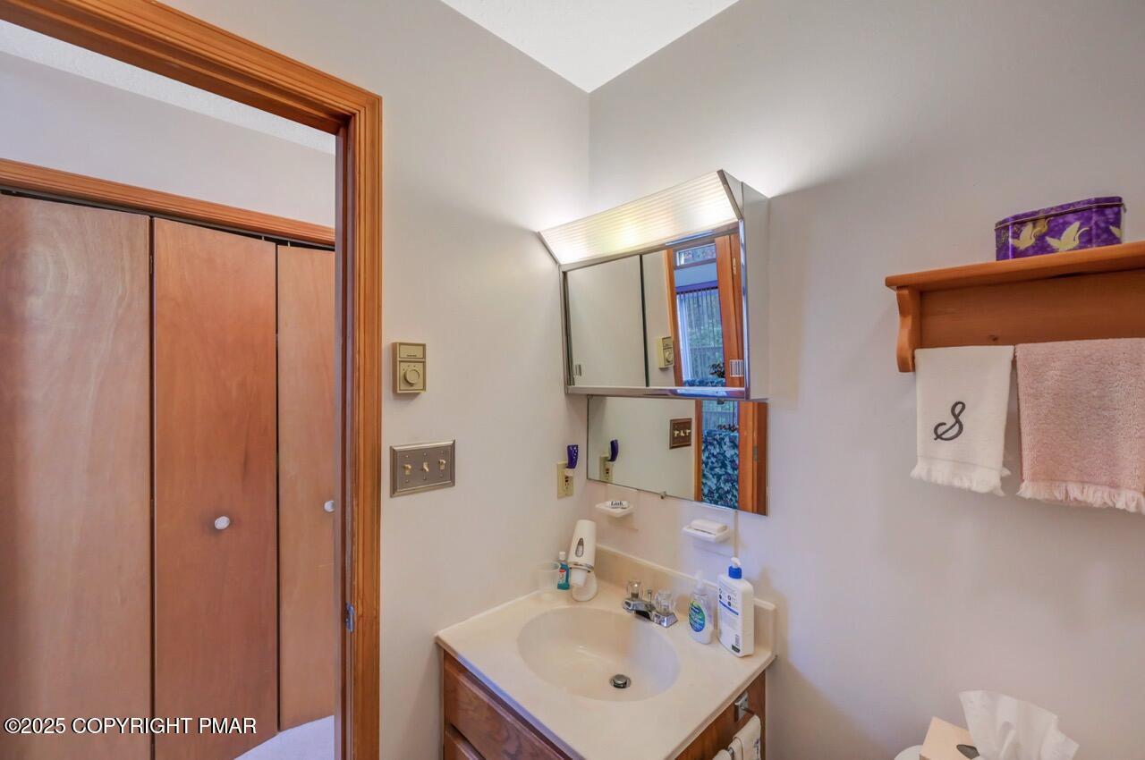 183 Panther Run Road Jim Thorpe, PA 18229 - Photo 31 of 59 a bathroom with a sink a mirror and a shower