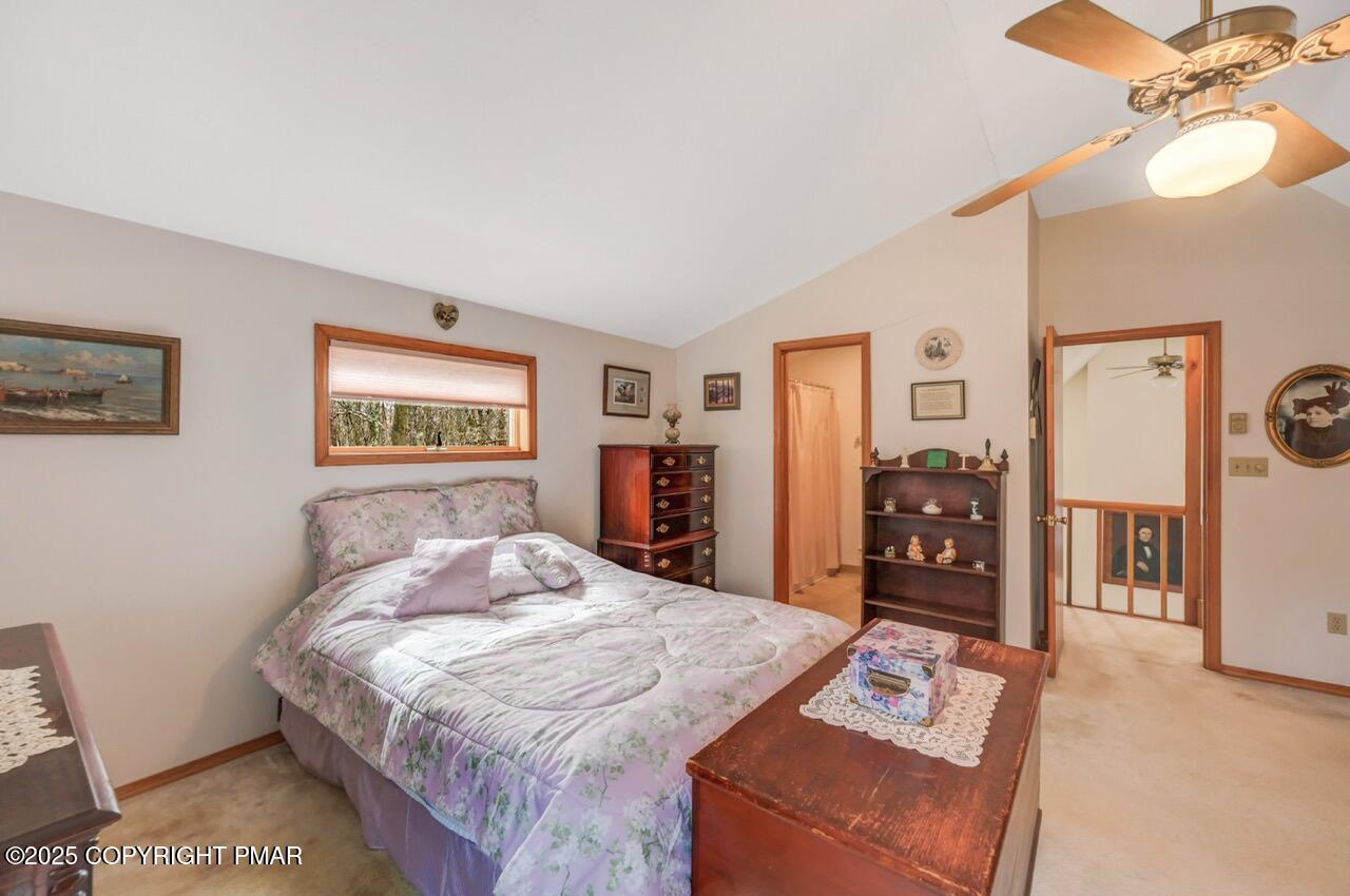 183 Panther Run Road Jim Thorpe, PA 18229 - Photo 41 of 59 a bedroom with a bed dresser and a large mirror
