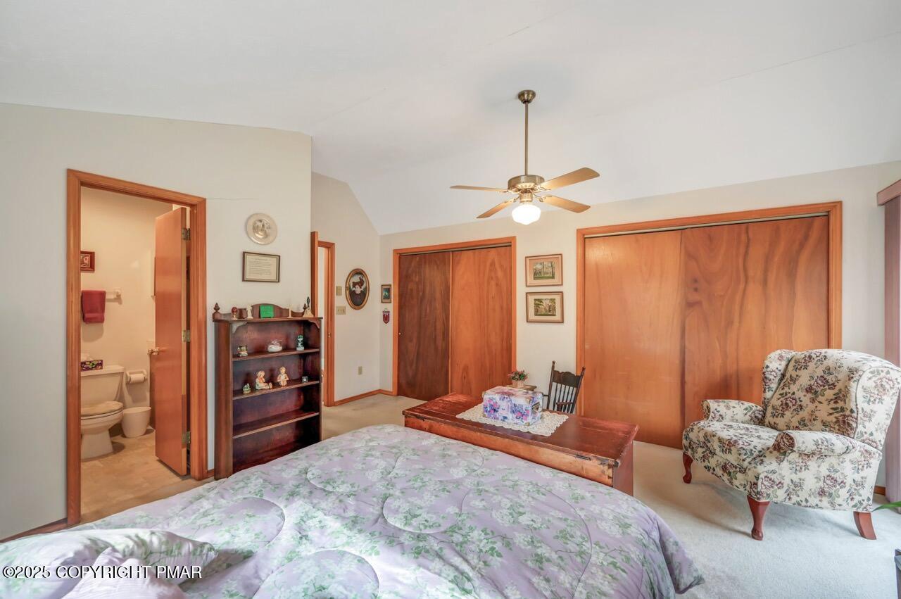 183 Panther Run Road Jim Thorpe, PA 18229 - Photo 42 of 59 a bedroom with furniture and a chandelier