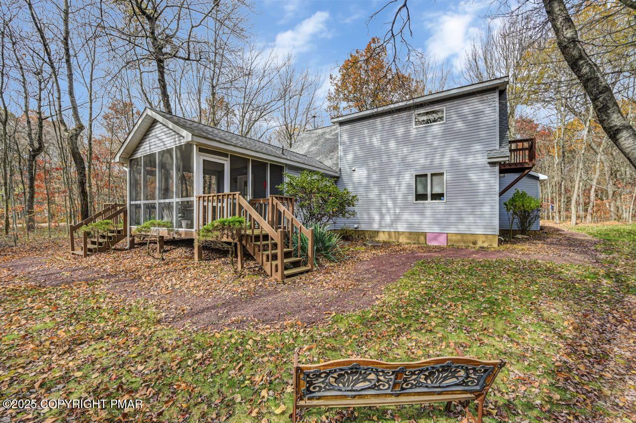 183 Panther Run Road Jim Thorpe, PA 18229 - Photo 7 of 59 a view of a chairs and table in backyard