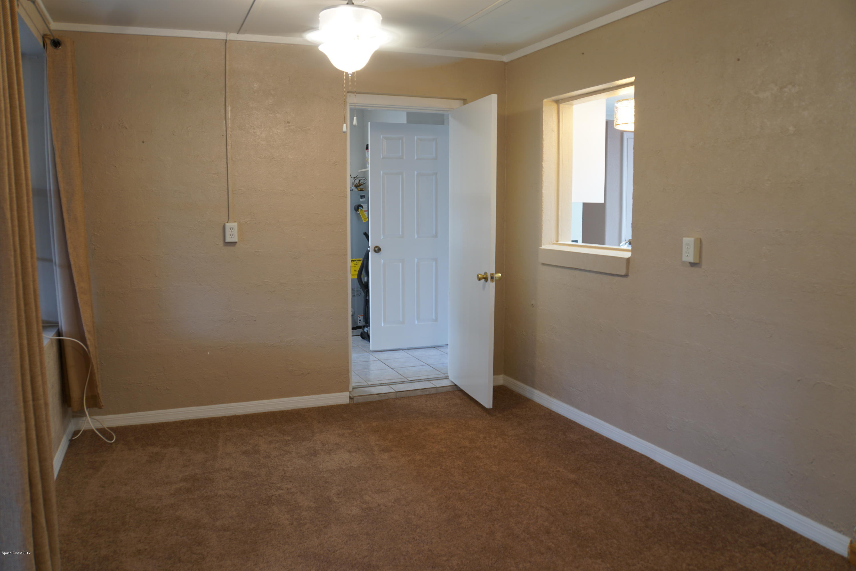 988 Kings Post Road Rockledge, FL 32955 - Photo 7 of 23 7
