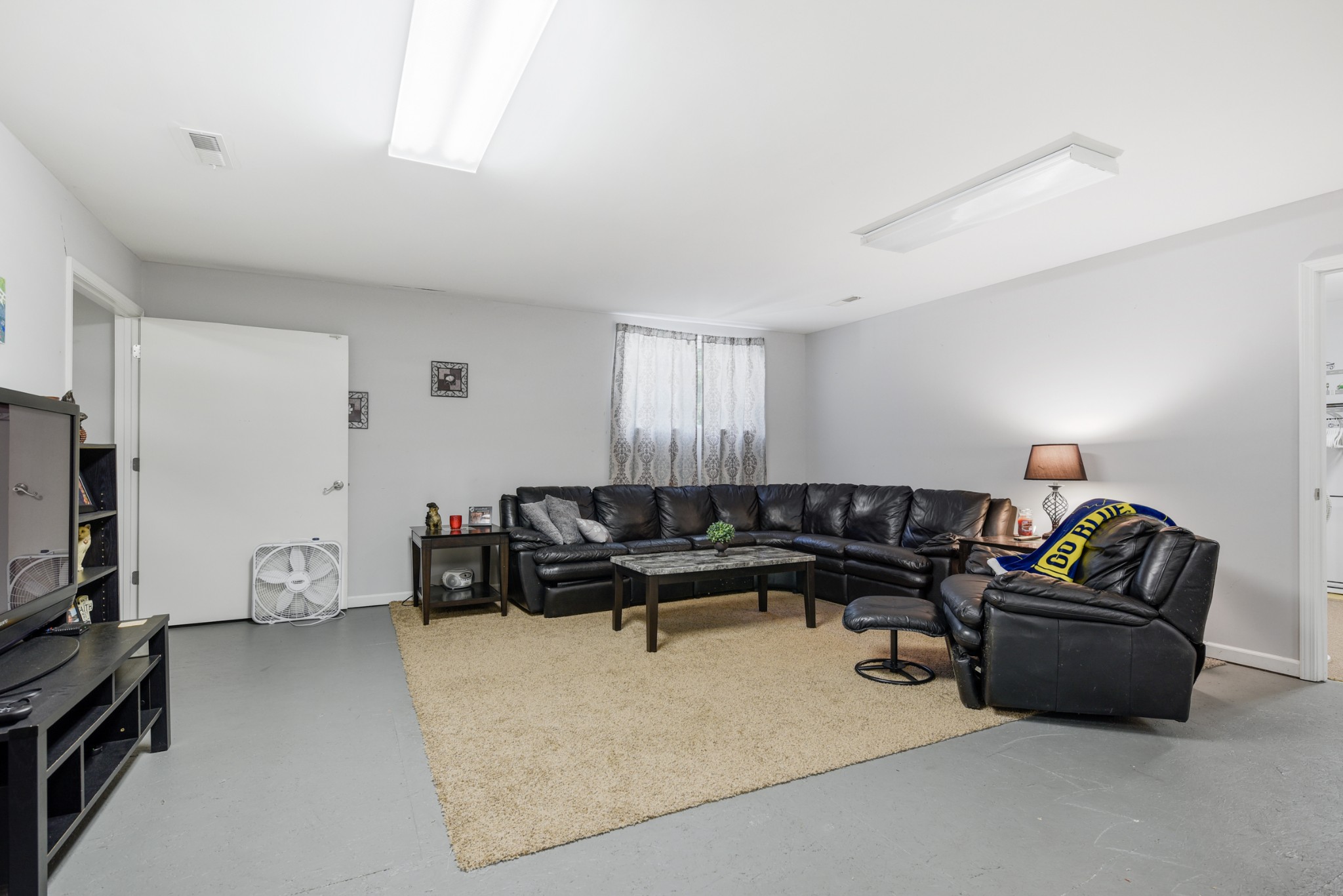 2650 McCrary Road Lebanon, TN 37090 - Photo 29 of 40 a living room with furniture and a flat screen tv
