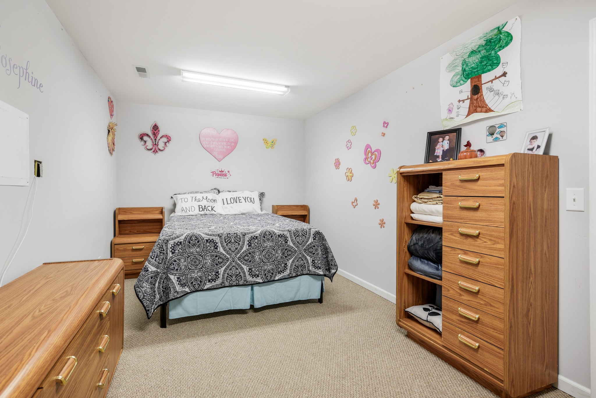 2650 McCrary Road Lebanon, TN 37090 - Photo 31 of 40 a bedroom with a bed and a dresser